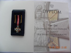 Dyplom z odznaką.