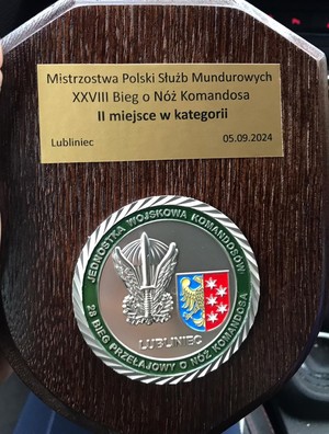 Na zdjęciu medal.